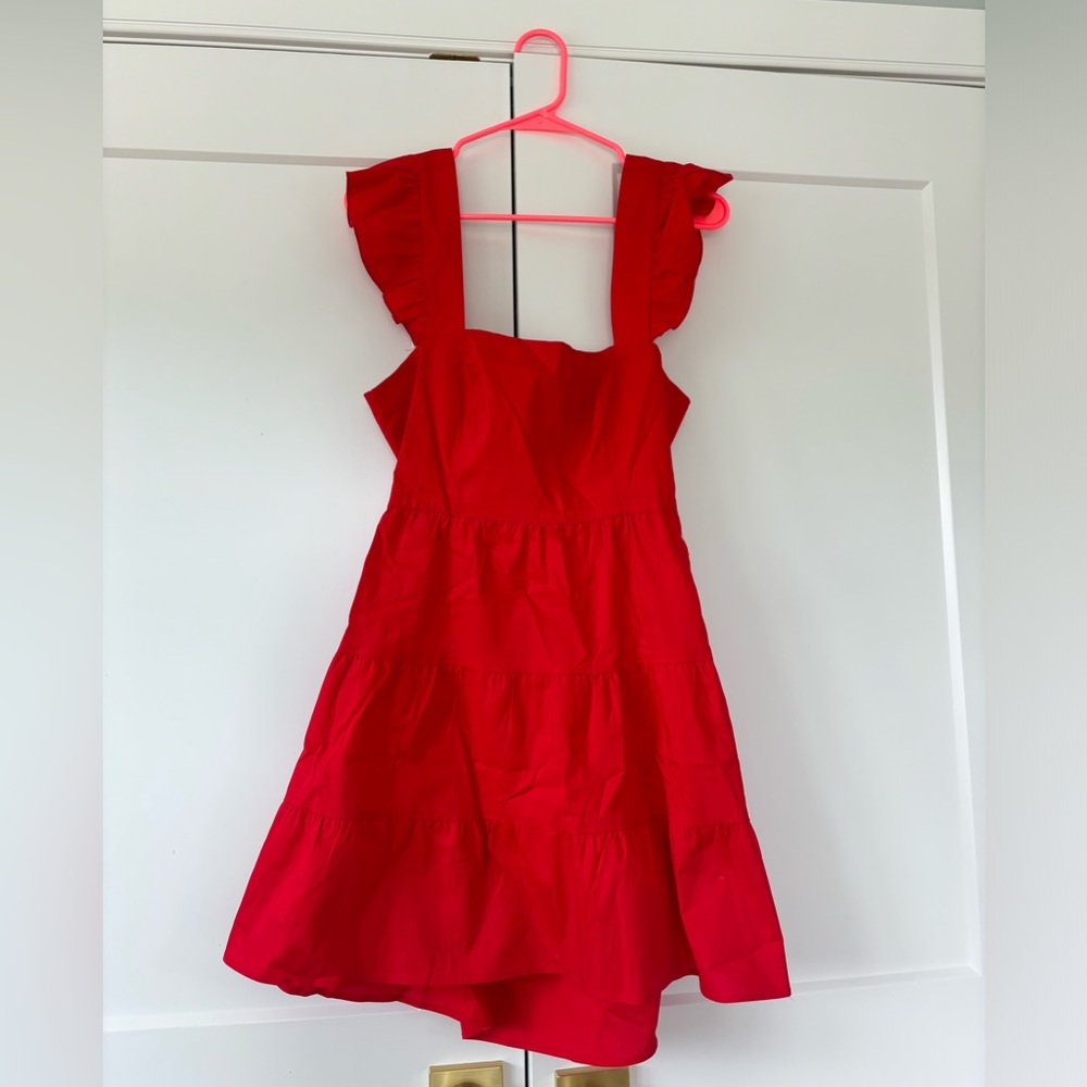 Show me your MuMu mini red ruffle dress with bow tie on semi open back. NWT